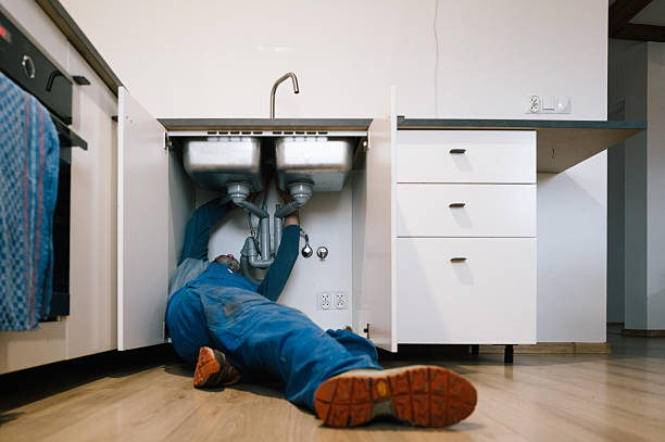 Professional Drain Cleaning technician working in Wellsville, KS